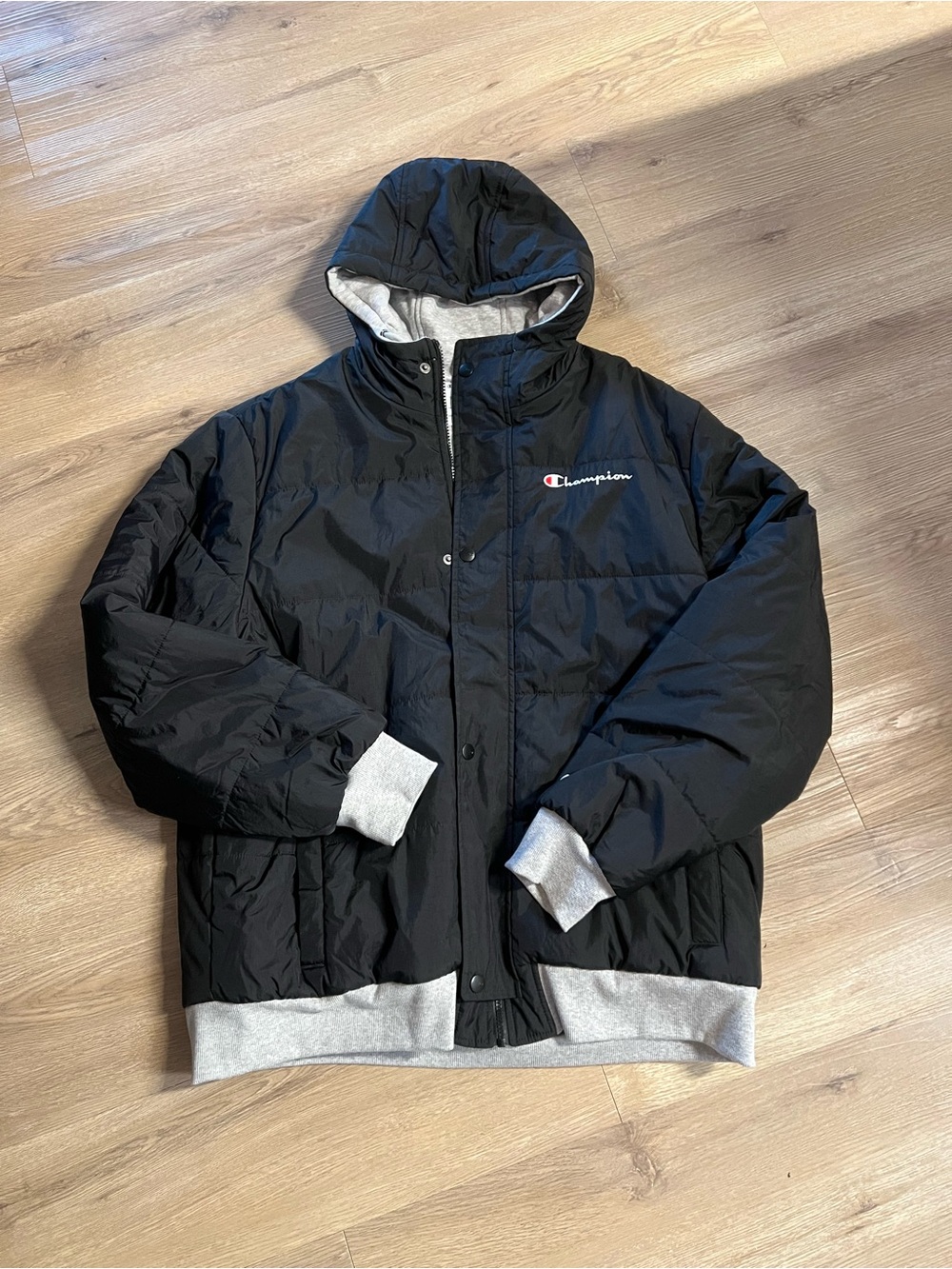 Champion Black Hooded Puffer Jacket with Gray Accents